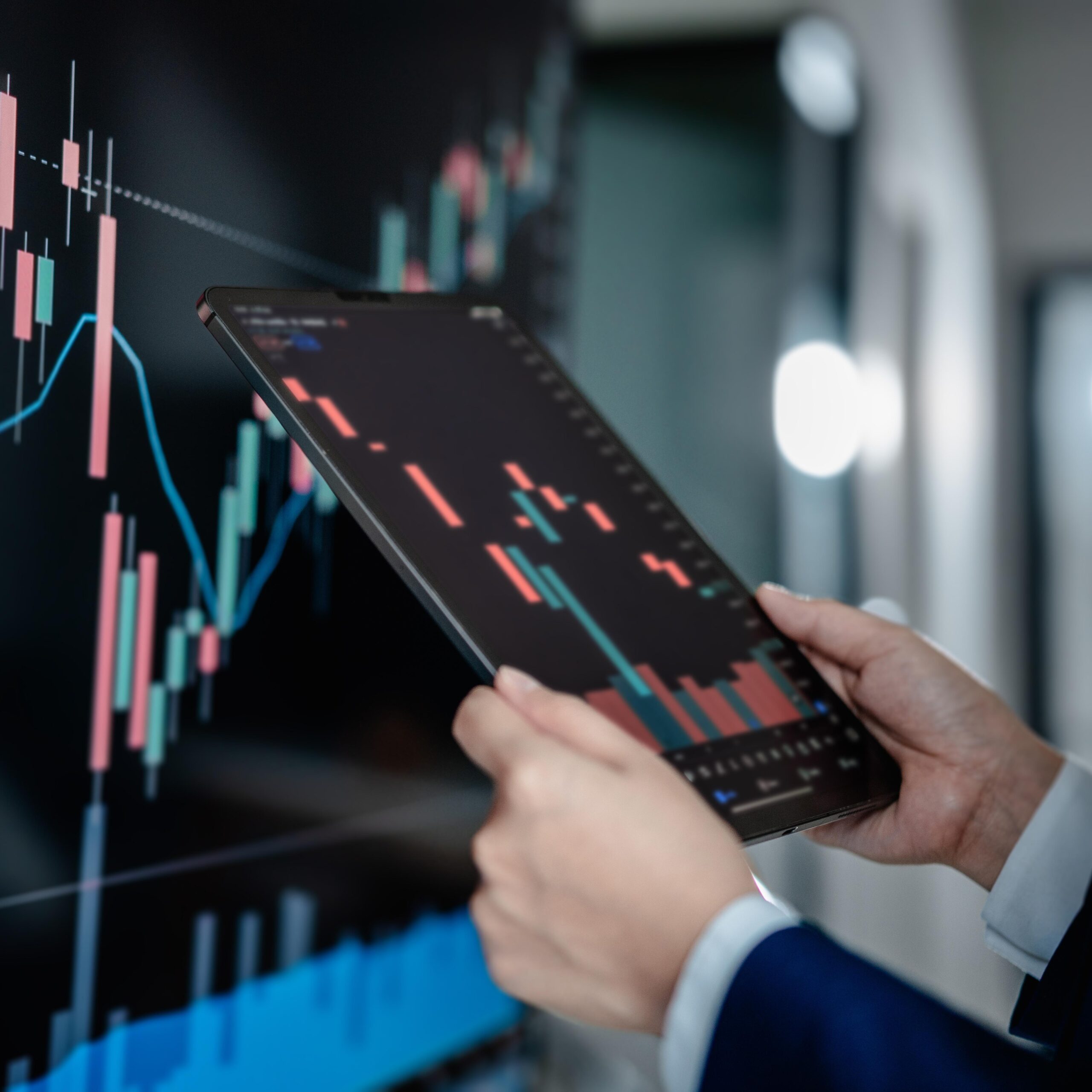 investors,analyze,graph,data,stock,market,index,via,digital,tablet